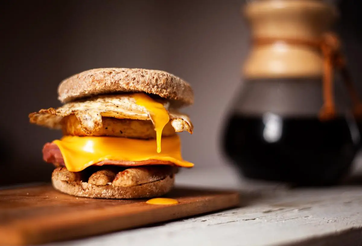 Egg McDuo breakfast sandwich on a wooden table